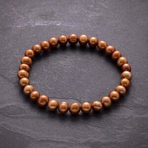 6-7mm Semi-Round Freshwater Orange Pearl Stretch Bracelet